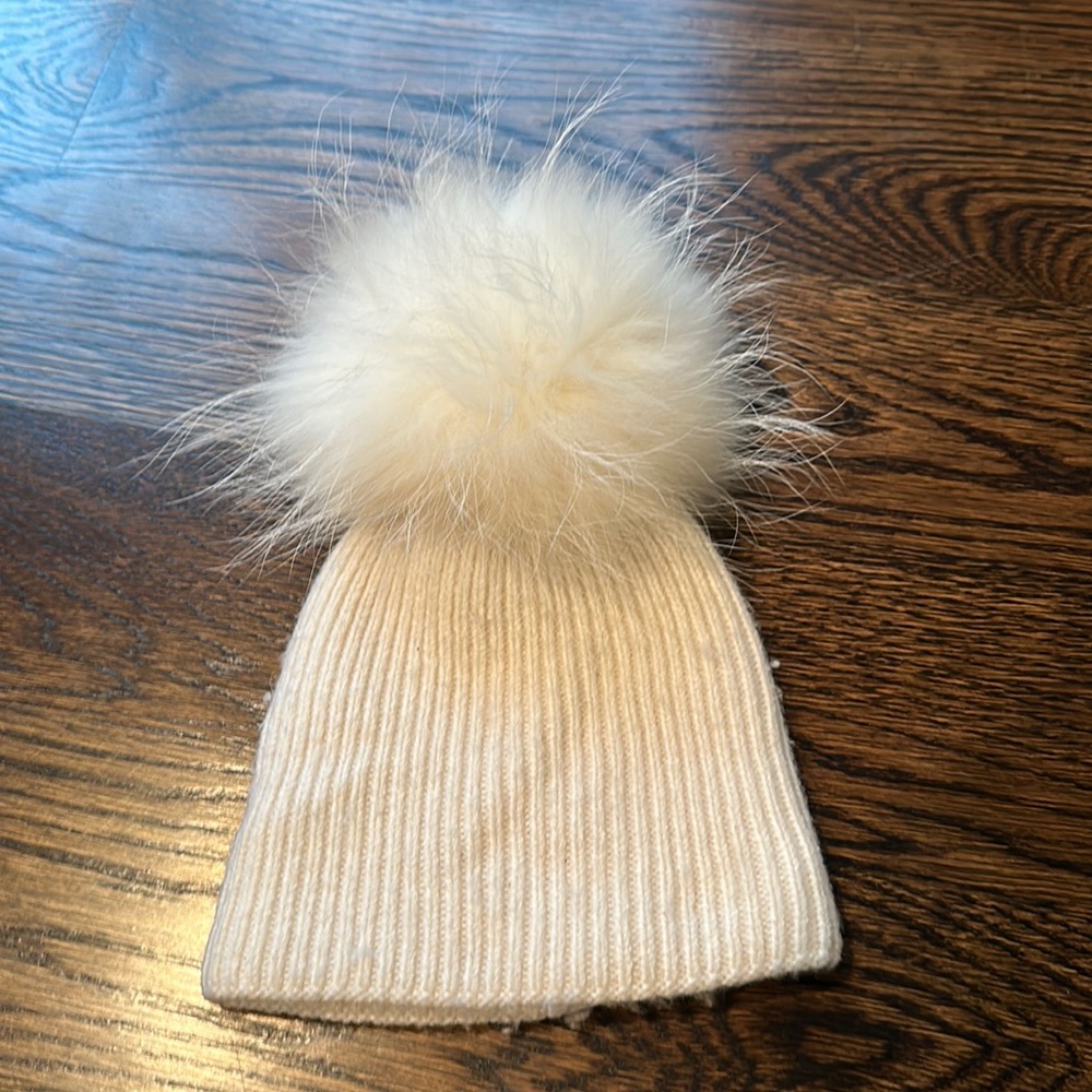 Maniere baby fur pom pom hat in ivory. Toddler size small
